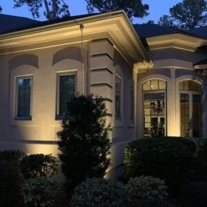 Outdoor home accent lighting design with landscape illumination in Bluffton, SC.
