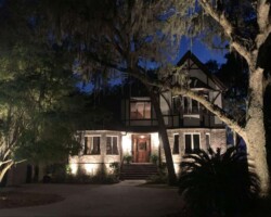 Create a warm, inviting glow for your Beaufort home’s exterior architecture with professional outdoor lighting solutions. High-quality outdoor lighting illuminating a striking Beaufort home at night, enhancing curb appeal and security.