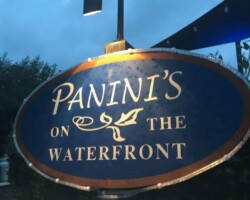 Enhance your commercial property ambiance with Murphy Outdoor Lighting, perfect for restaurant signage and decor. Dramatic outdoor lighting highlighting a commercial waterfront restaurant sign in Beaufort, South Carolina.