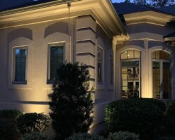 Landscape and exterior lighting enhances curb appeal and safety at night in Bluffton, SC. Outdoor home accent lighting design with landscape illumination in Bluffton, SC.